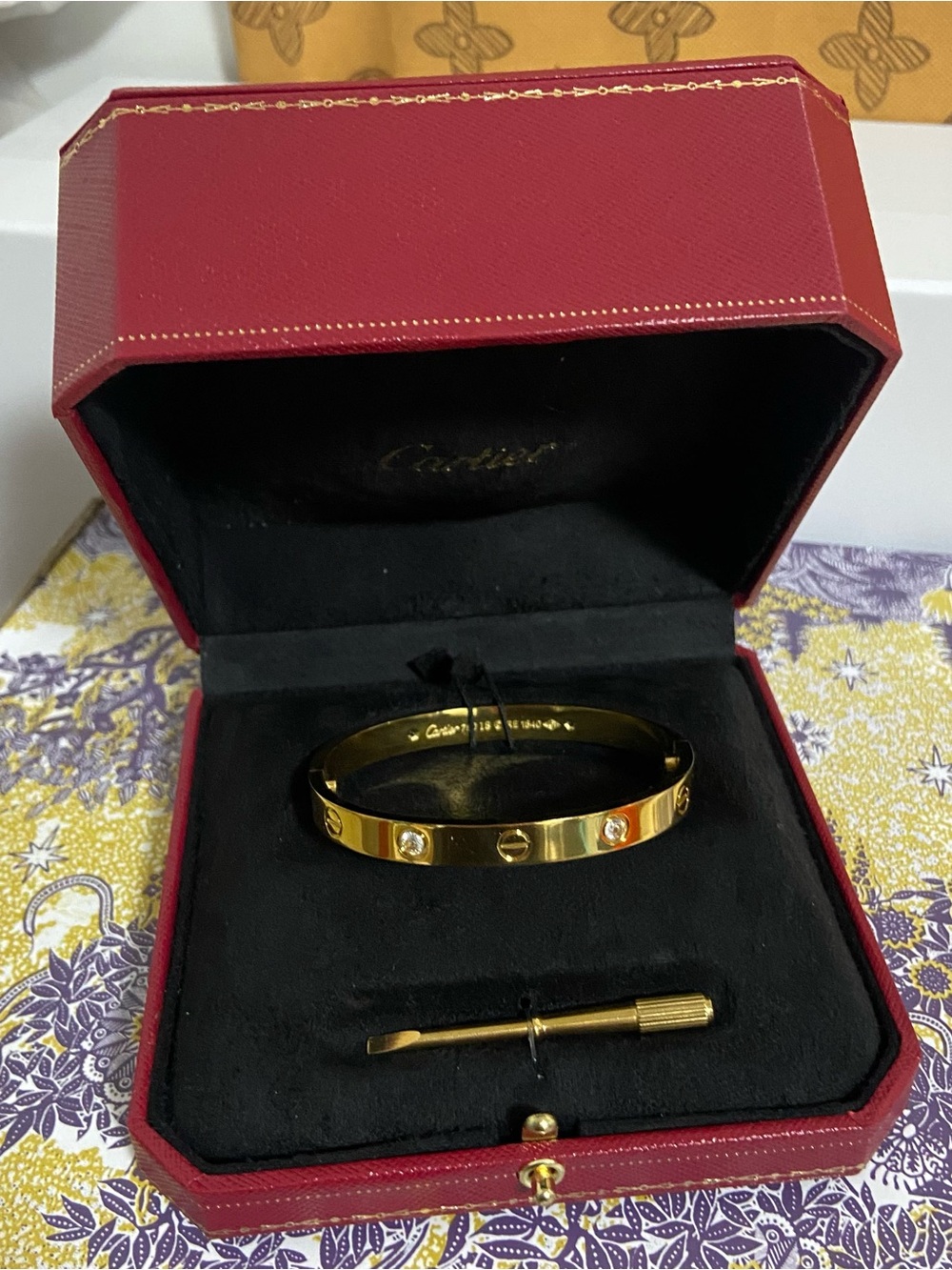 Good Cartier Gold Bangle Bracelet with Diamond Accents